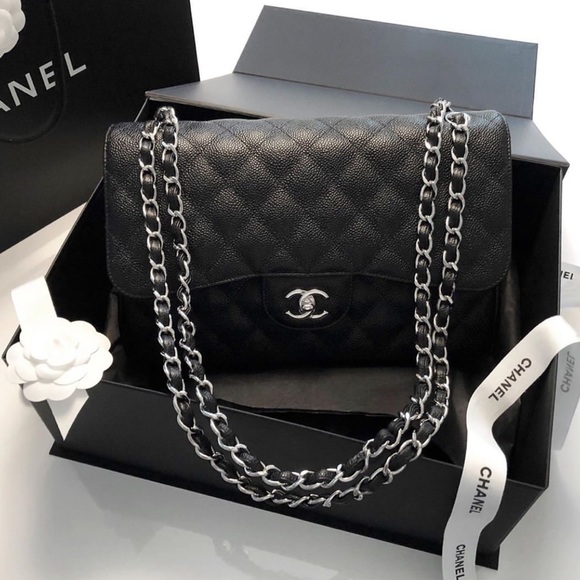 CHANEL Handbags - 💯 auth Chanel large jumbo caviar classic flap bag